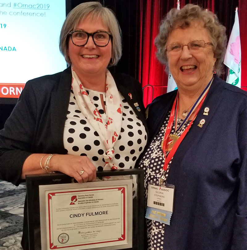 Cindy Fulmore is seen with Gloria Stephens as she accepts the Gloria Stephens Award for Excellence as an Educator in Perioperative Nursing during the 2019 ORNAC National Conference